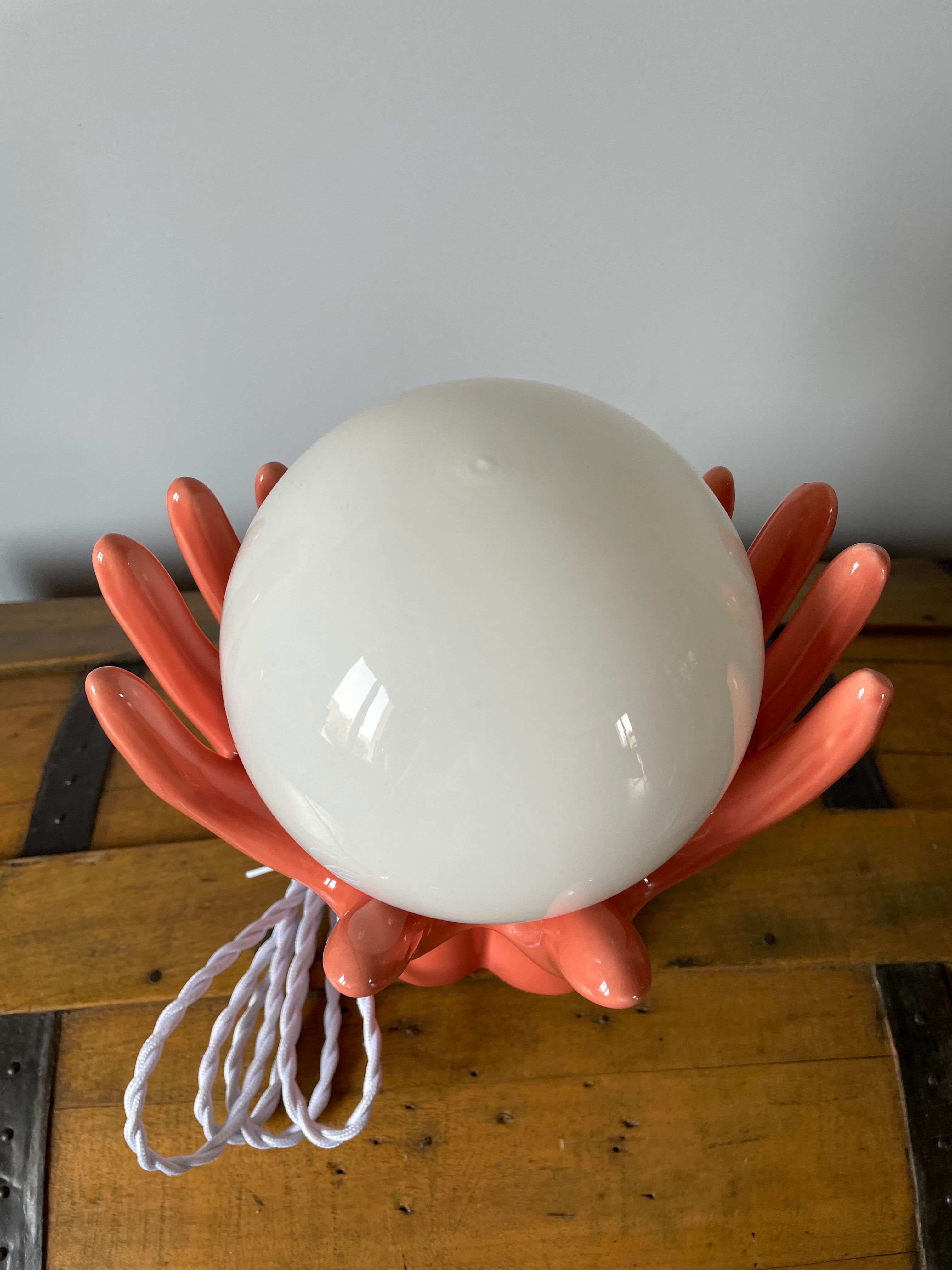 Hand lamp in ceramic color coral electrified to new