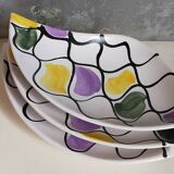 Three vintage free-form ceramic ravine dishes from the 1950s