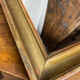 Antique mirror in gilded wood