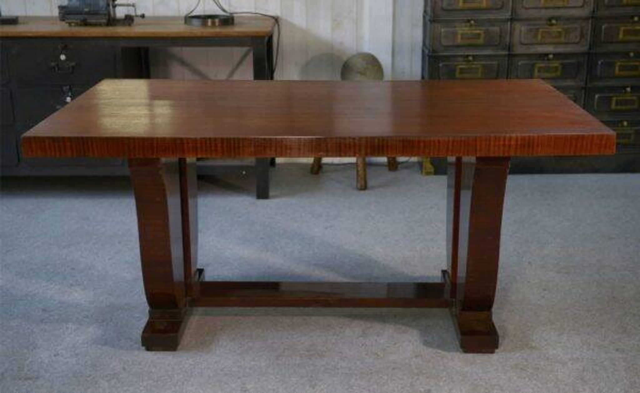 Art Deco mahogany veneer table in the style of Jules Leleu, 1930s