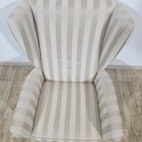 Winged armchair with footstool, 1960s.