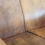 Charming 2-seater designer sofa made of sheep leather with a rustic look