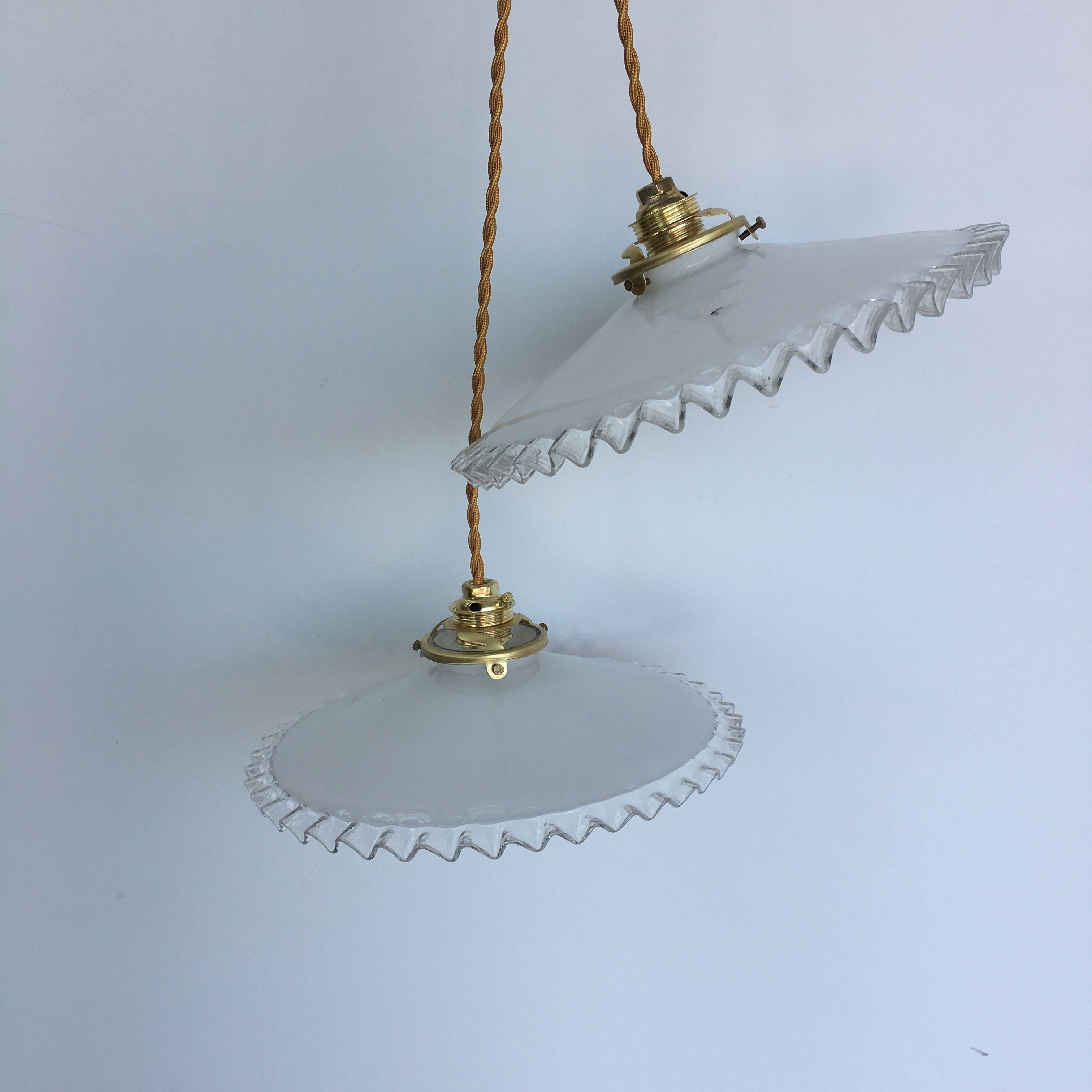 Pair of white opaline and toothed edges hanging lamps