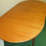 Teak dining table, an extension