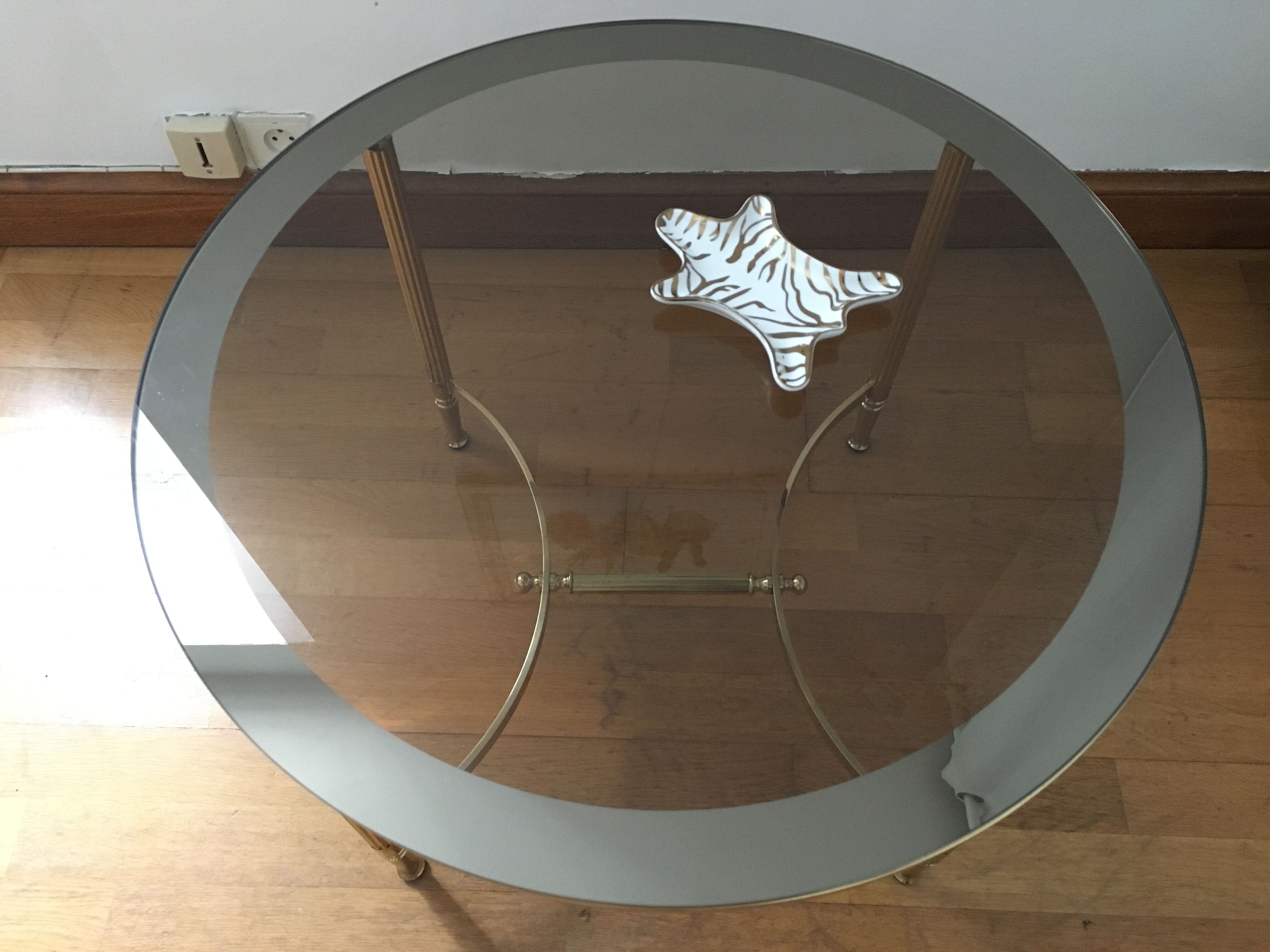 Brass round coffee table and smoked glass