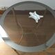 Brass round coffee table and smoked glass