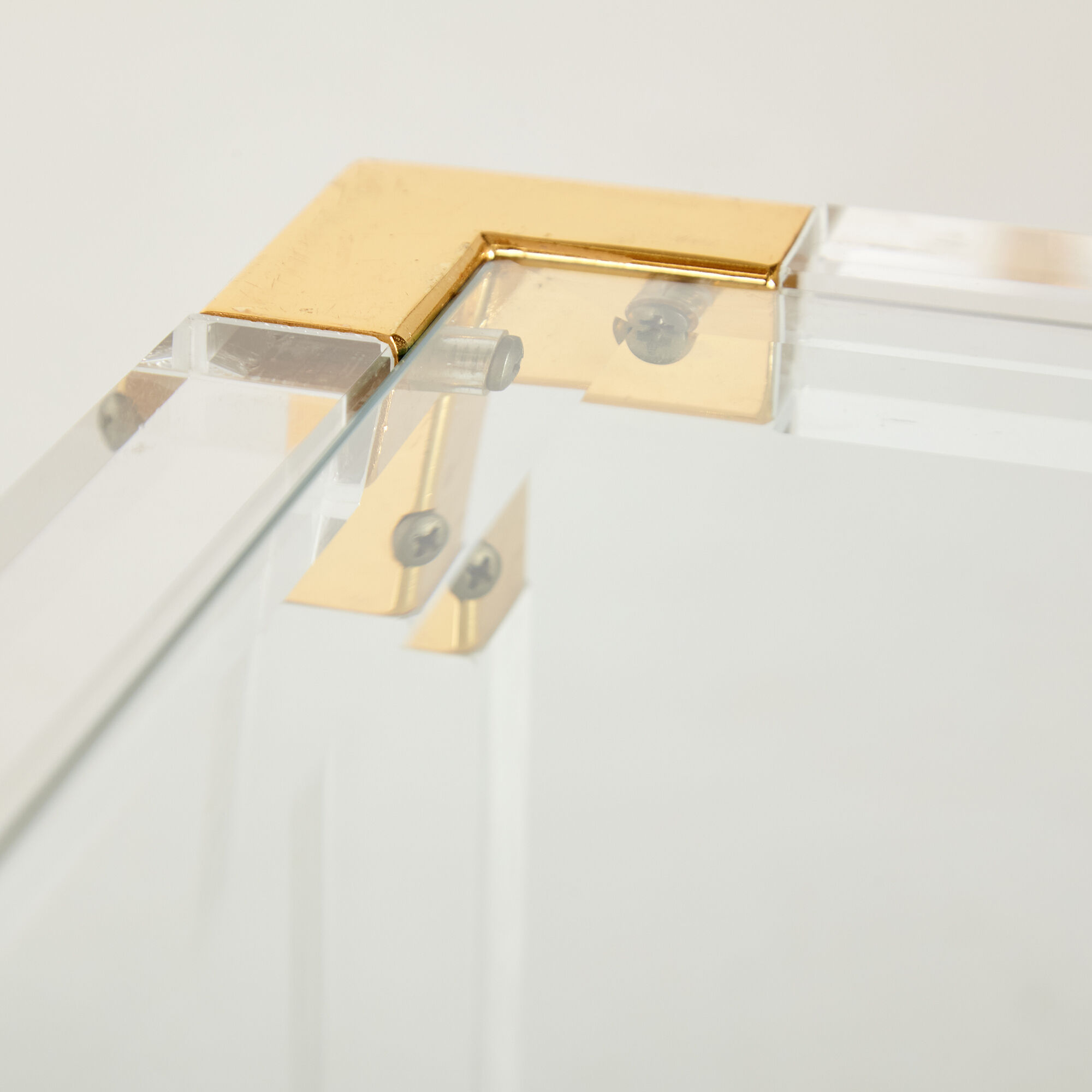 Glass and brass coffee table