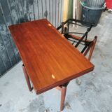 Vintage coffee table with Scandinavian rise and fall system in teak