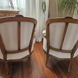 Paire de fauteuils type bergère blancs
