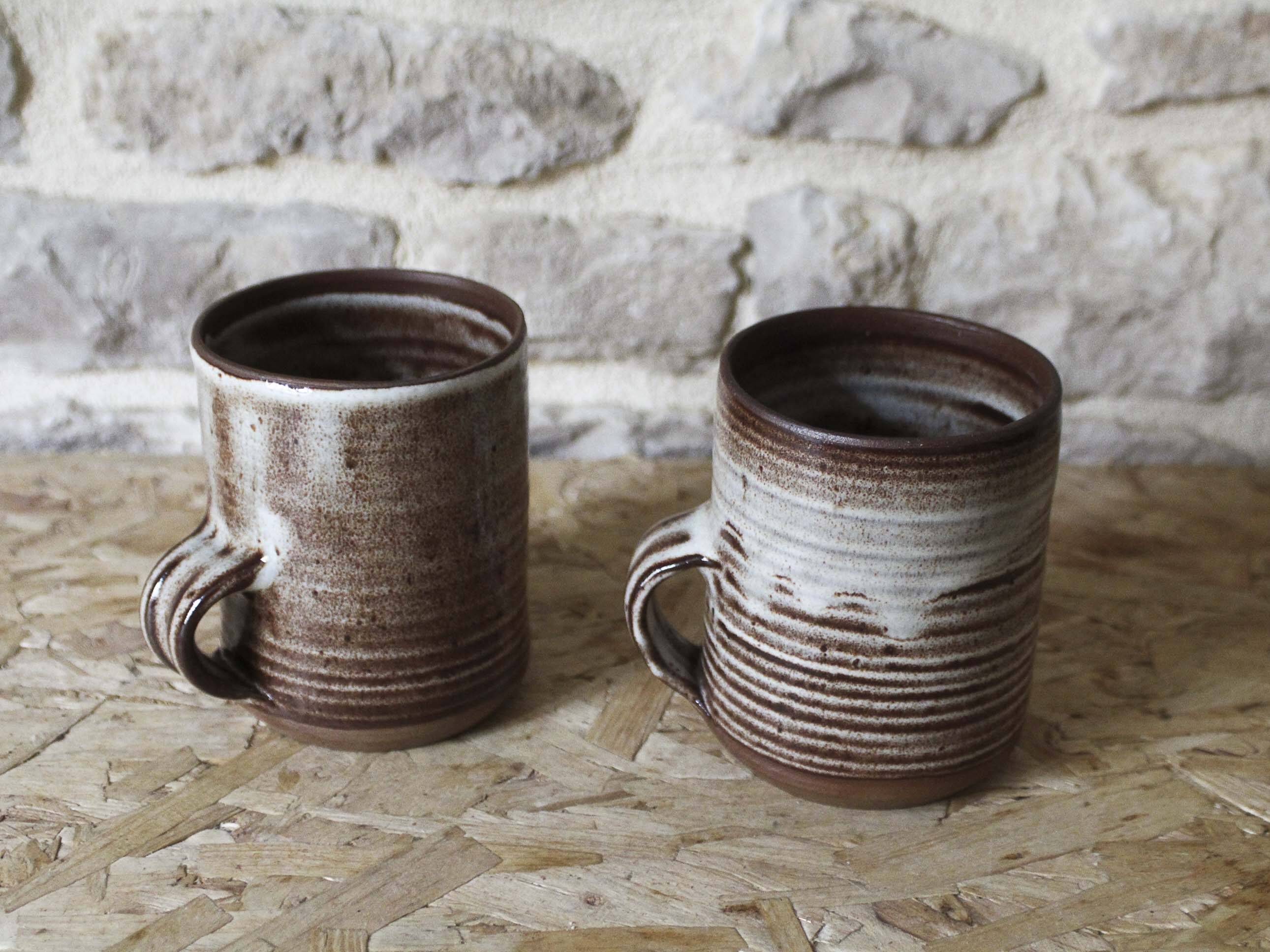 Pair of Roger Jacques Puisaye enameled stoneware cups