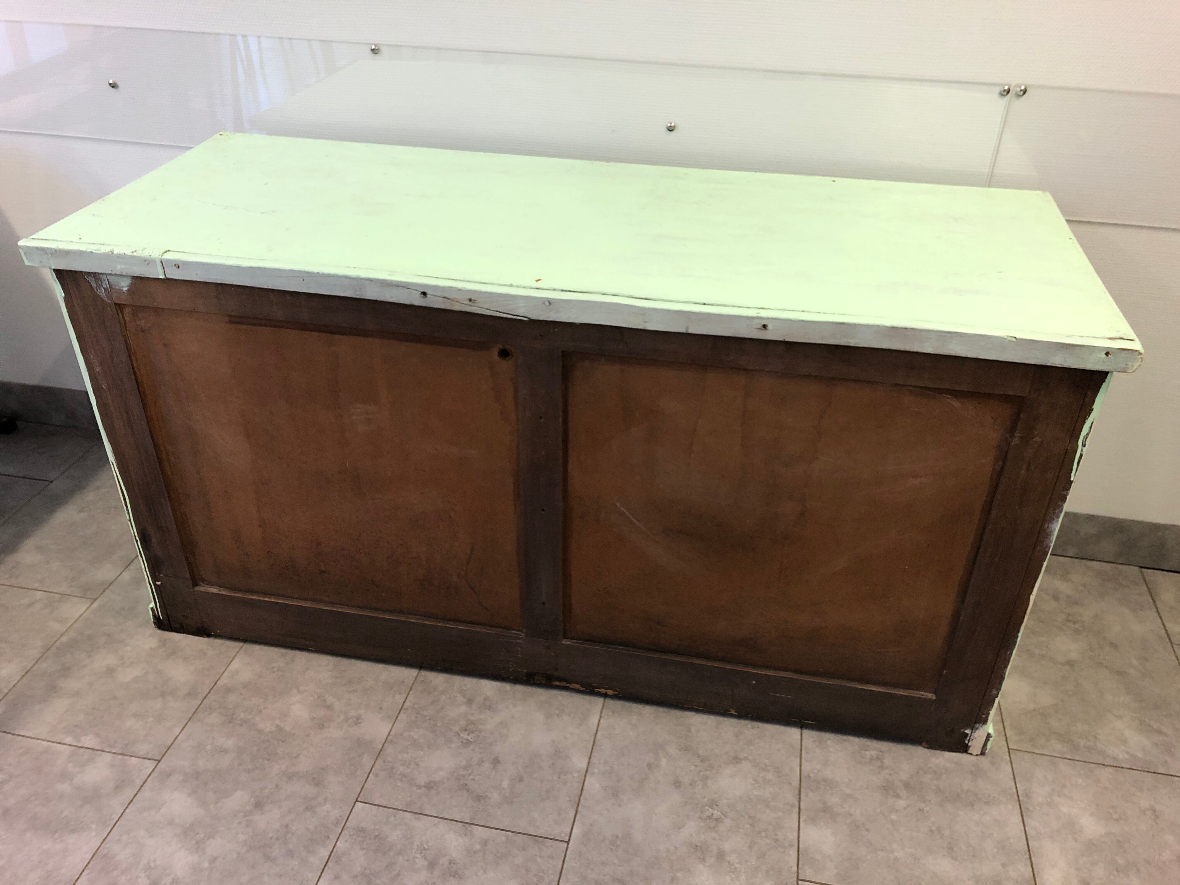 Low green patinated furniture