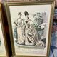 Pair of framed fashion engravings from the 19th century.