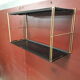 Wall-mounted Tomado showcase 1960