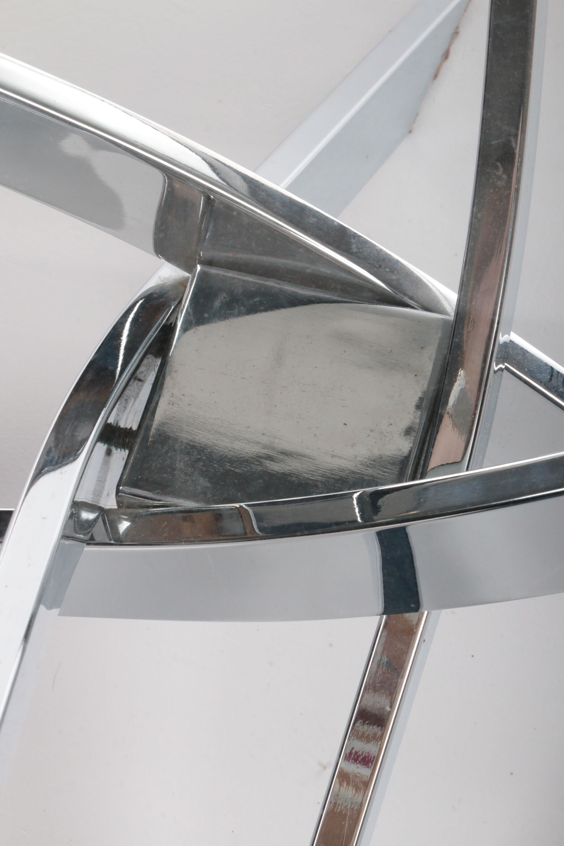 Vintage chrome coffee table with X frame and round glass top, 1980s