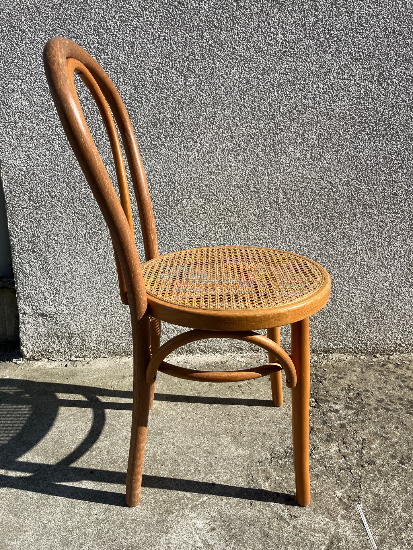 Set of 4 bentwood bistro chairs with caning.