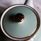 Antique Villeroy and Boch ceramic teapot in gold and celadon green.
