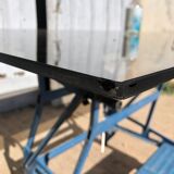 Glass and chrome metal dining table