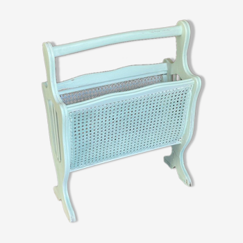 Old wooden and cane magazine rack