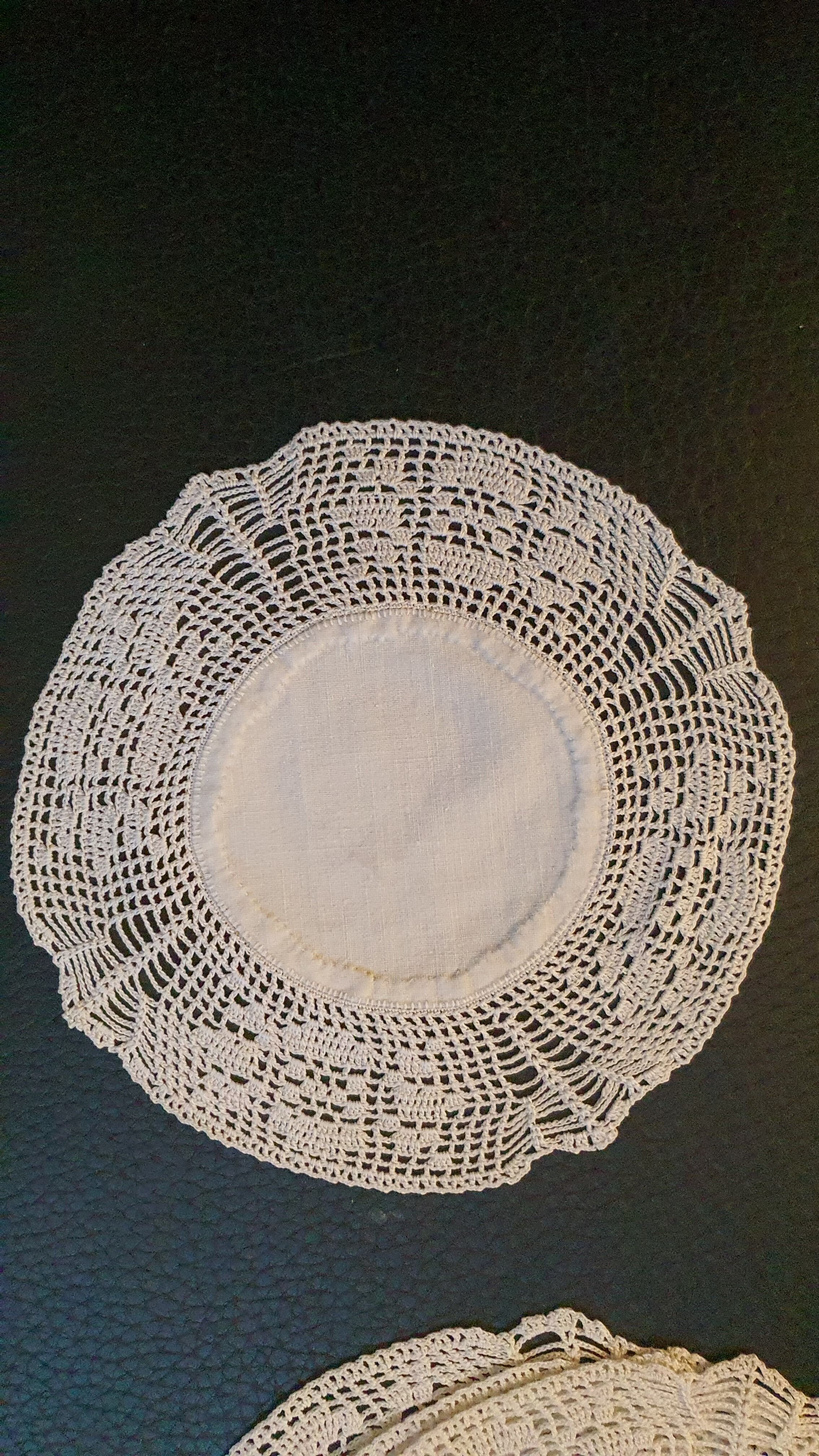 Antique coasters lined with art crochet