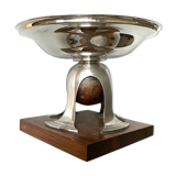 Art deco cut rosewood sphere enclosed in silver metal foot