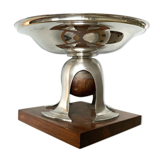Art deco cut rosewood sphere enclosed in silver metal foot