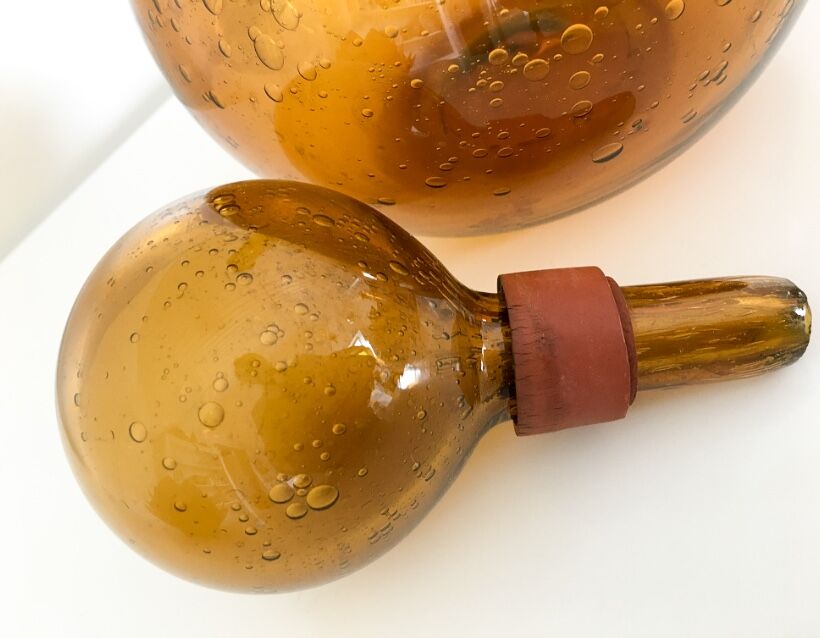 Biot blown glass amber bottle