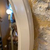 Oval mirror in white wood