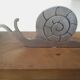 Cado brand snail piques door