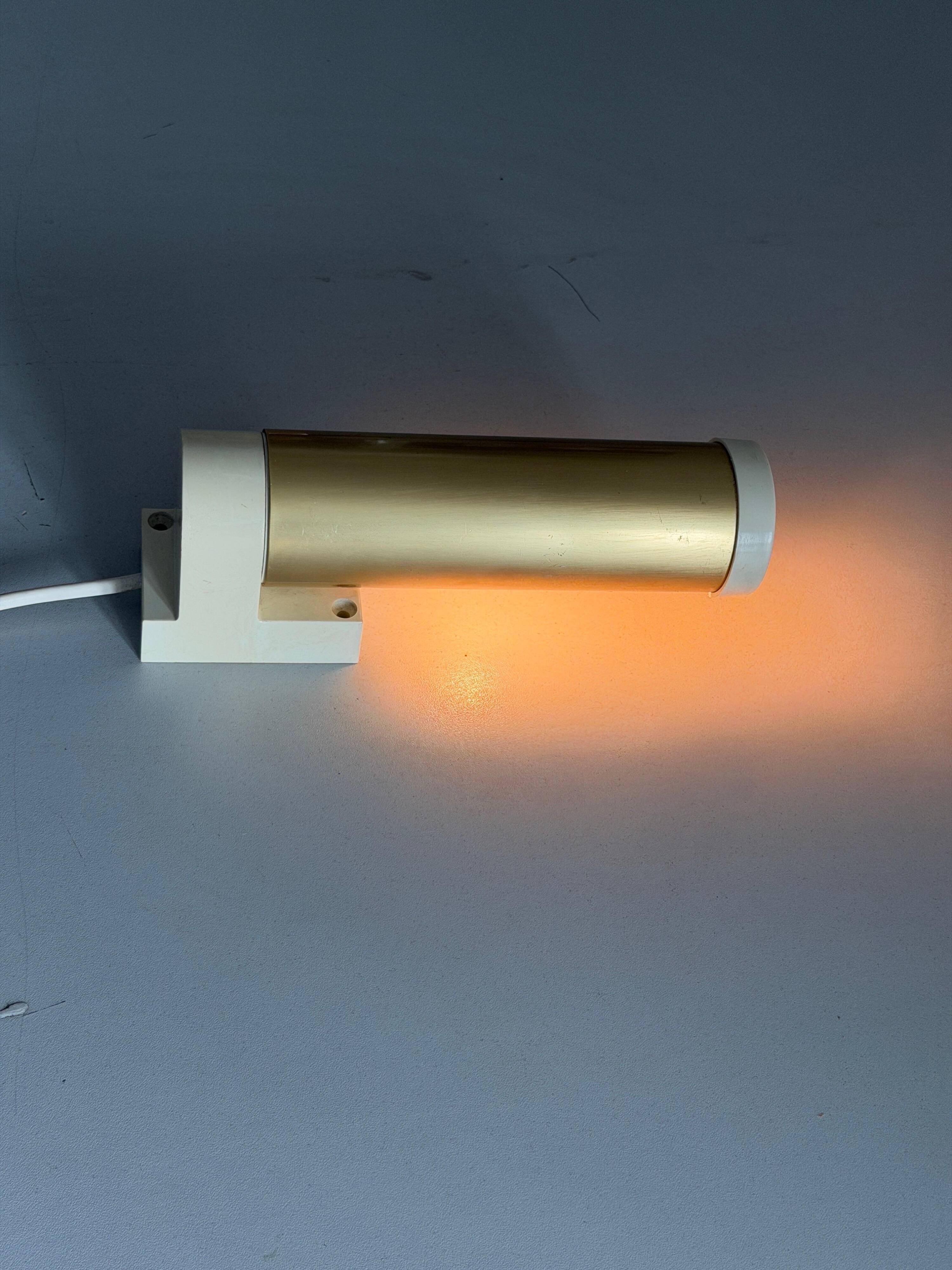 Simple wall light in plexiglass and metal by ERCO, 1970s, Germany.
