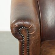 Fauteuil club en cuir de mouton vintage