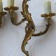 Old pairs of bronze wall sconces