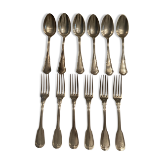 Set: 6 forks and 6 spoons. Silver metal . 2 models