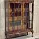 English Chippendale walnut display cabinet from the 1930s