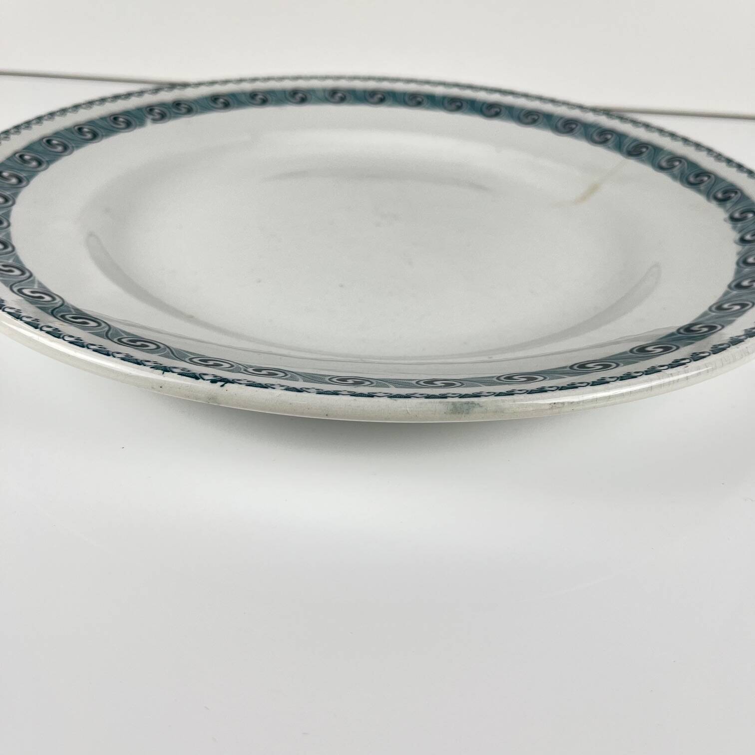 Large round dish "Rachel" Moulins des loups & Hamage, iron earth, 20th century