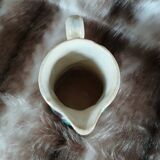 Antique slipware milk jug