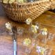 Knife rests, flower vases and candle holders in blown glass.