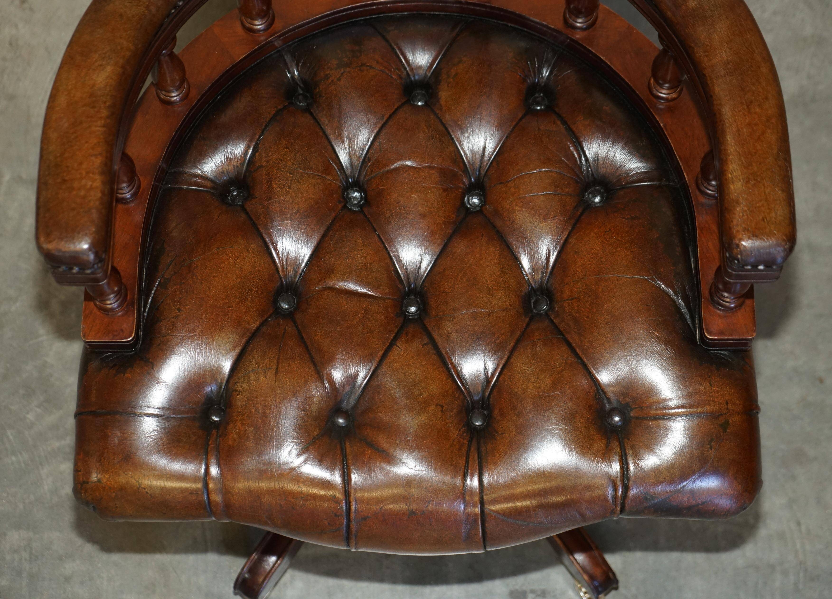 Vintage Chesterfield captain's chair in leather