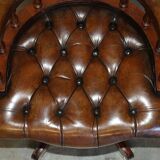 Vintage Chesterfield captain's chair in leather