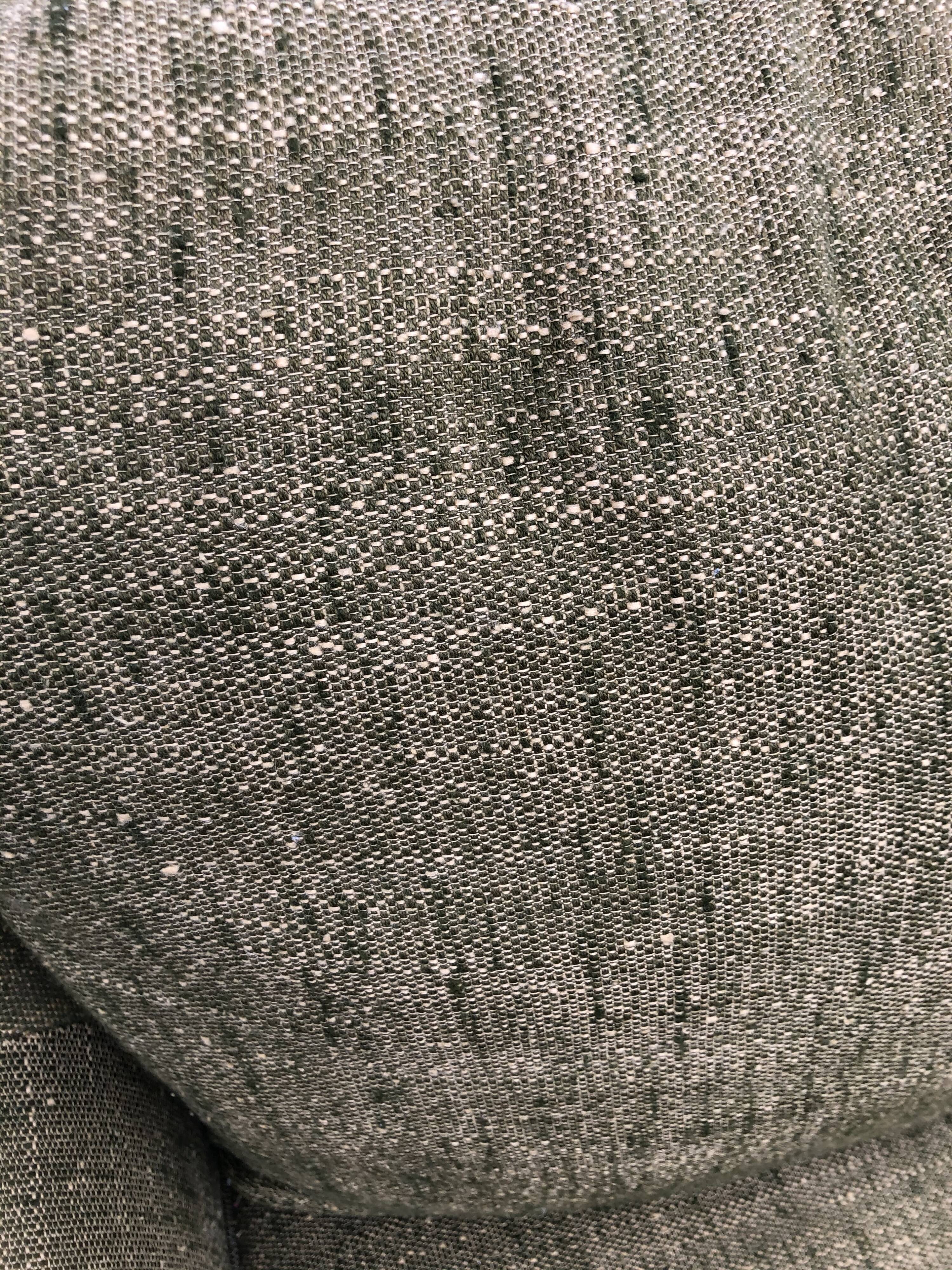 Paire de fauteuils seventies en tweed vert