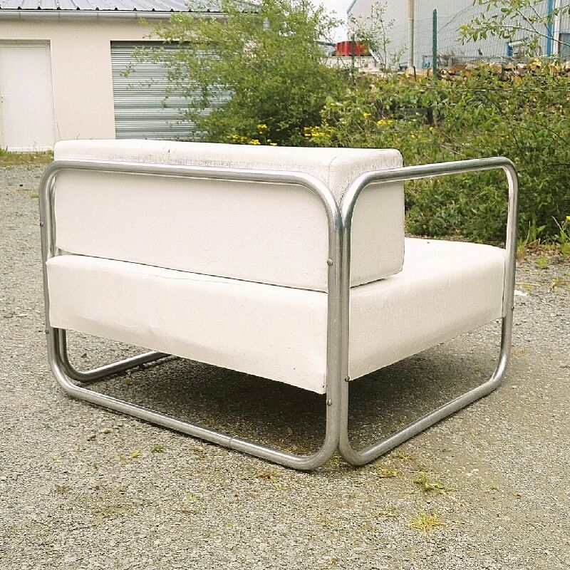 Chrome-designed chair and faux white leather 1970