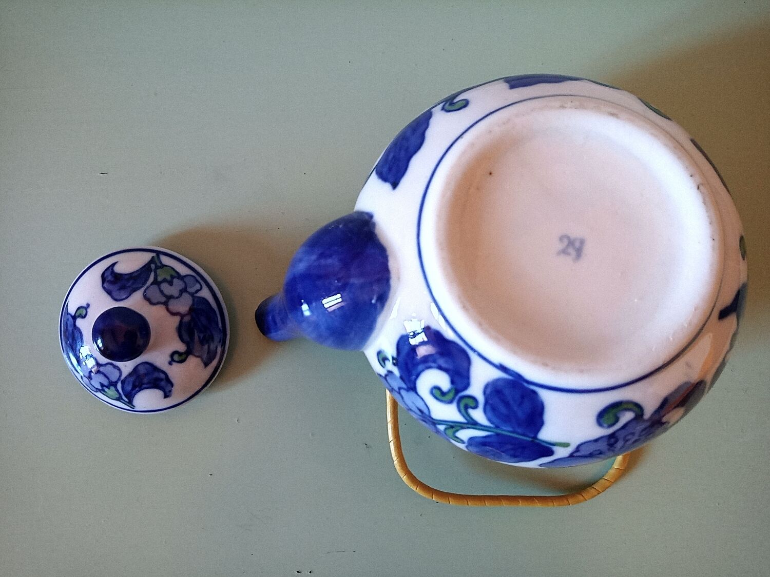 Hand-painted blue floral pattern teapot