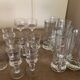 Set of 21 small liqueur glasses and 16 small cups and ramekins.