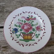 Old St Clément earthenware plate, flat plate with flower patterns.