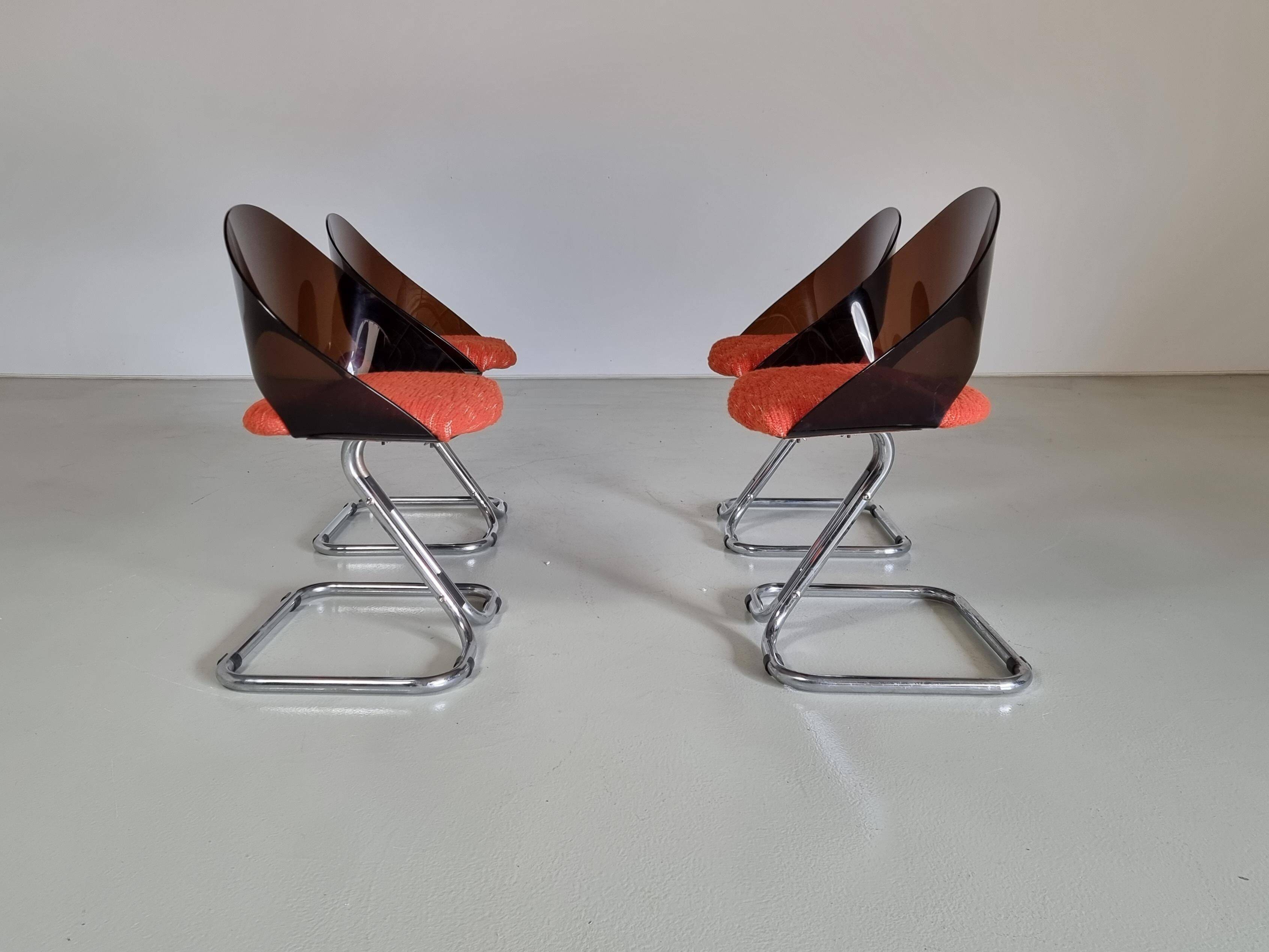 Set of 4 Italian dining chairs in plexiglass from the Spage era, 1970.