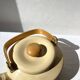 Vintage enamelled metal kettle in beige, Copco style.