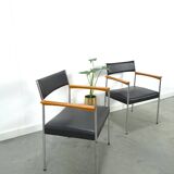 Chaises DDR avec base chromée et revêtement noir, chaises de salle à manger