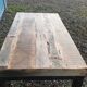 Industrial coffee table with wooden top and metal legs