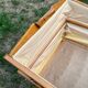 Wooden designer travel cot