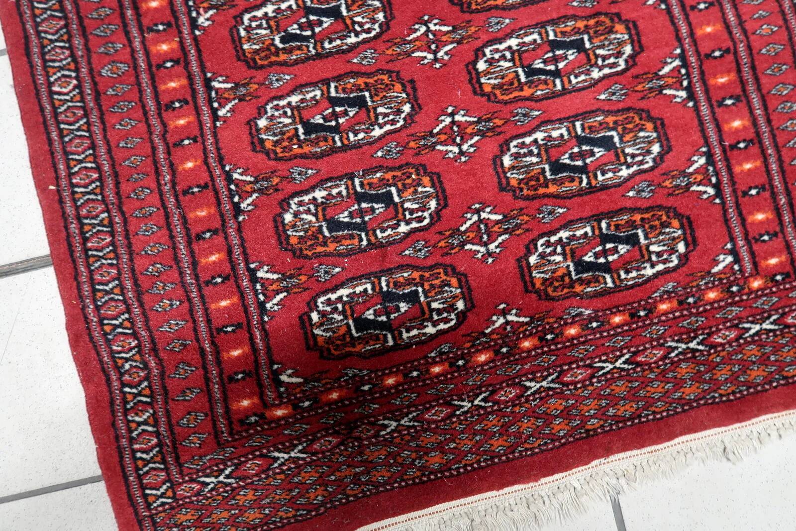 Handmade vintage Uzbek Bukhara rug 86cm x 125cm, 1960s