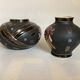 Pair of matte and glazed ceramic vases